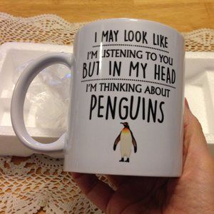 Humorous coffee cup, thinking of penguins